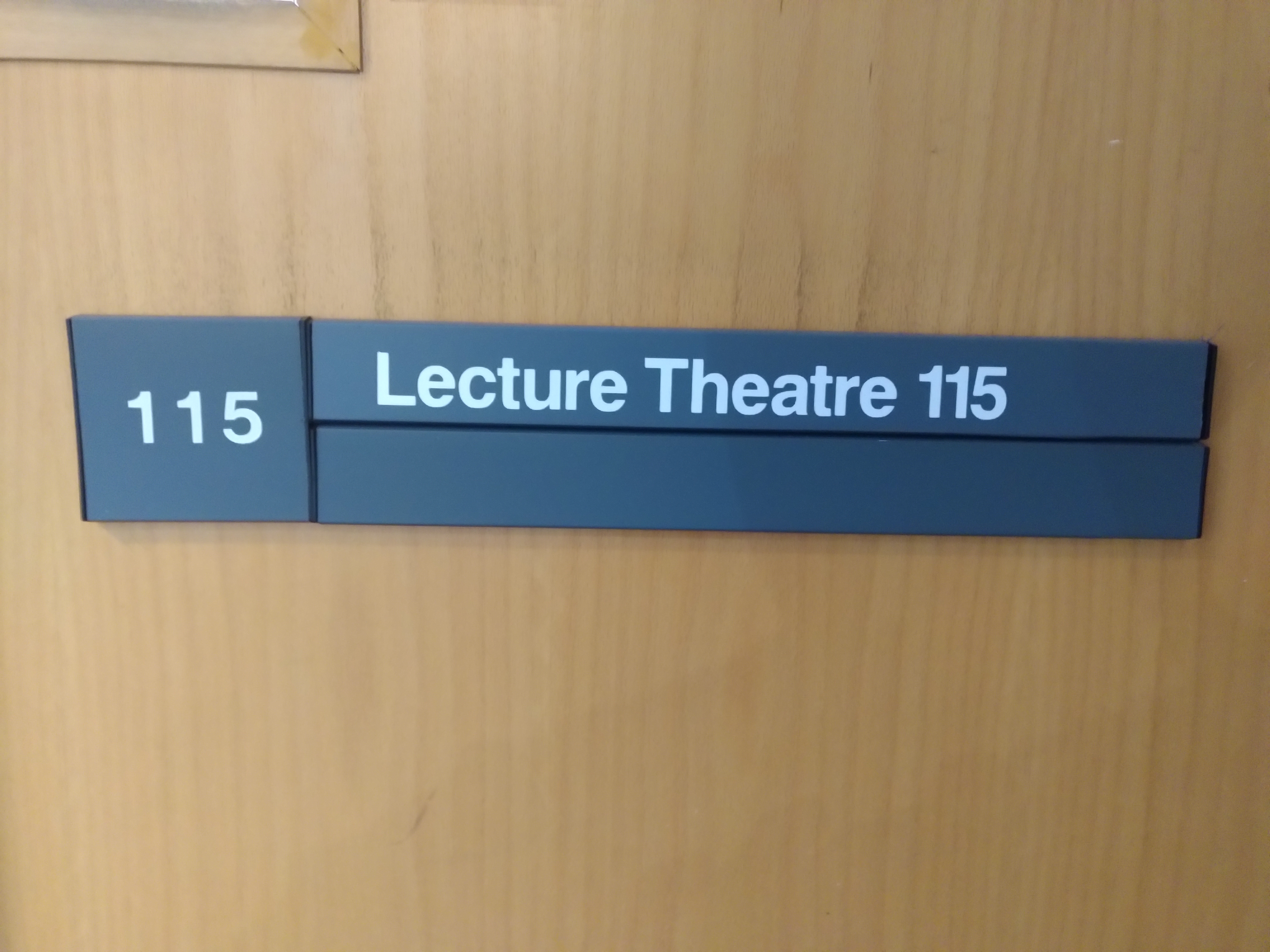 The figure on the right reads Lecture Theatre 115. The figure on the left reads Galton Lecture Theatre. This lecture theatre was formerly named the Galton Lecture Theatre until 2020. Victorian scientist Sir Francis Galton (1822-1911) coined the term eugenics and endowed UCL with his personal collection and archive along with a bequest for the country's first professorial Chair and Eugenics. Following the recommendations of the inquiry into the History of Eugenics at UCL, UCL decided to de-name the Galton Lecture Theatre in July 2020. This change was a number of actions aimed at acknowledging and addressing the impact of the university's historical links with the eugenics movement.